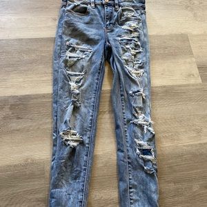 Distressed jeans never worn
